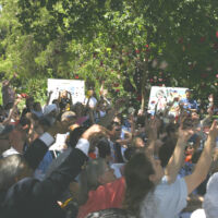State Capitol 1st Anniversary 2004 People are throwing rose petal in the air