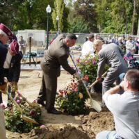 State Capitol Veterans Planting 2003 men in suits with shovels are planting roses