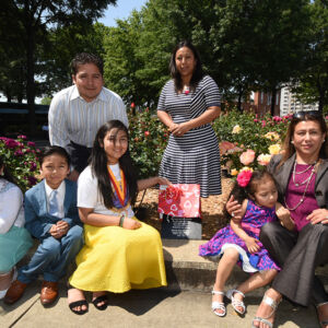 Winner & Family-Atlanta 2018 Family gathered around a new plaque