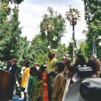 State Capitol Dedication 2003 people in national costumes celebrating