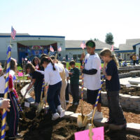 Southport Planting 2007 children with shovels are planting roses