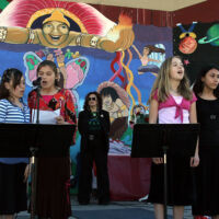Southport Dedication Day 2007 children are singing into microphone
