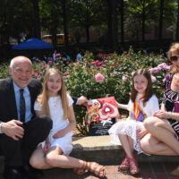 Alabama Winner-Atlanta 2018 Family gathered around a plaque