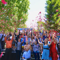 July 4 2018 many people tossing rose petals in the air