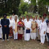 Sikh & Brahma Kumaris group photo Sikh & Brahma Kumaris poeple in festive clothes gathered for a picture