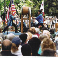 Taiko Drummers Capitol 2003 people watching a drummer perform
