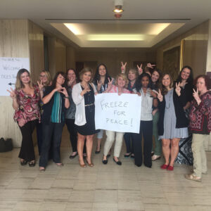 Georgia 2017 Women holding Freeze for Peace sign