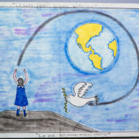 Mexico City A girl is sanding a white dove to fly around the Earth