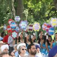 Planting of Qualities of Peace 2013 People holding flowers with peace messages